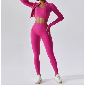 Three-piece rose red yoga set with supportive bra, zip jacket and high-waist leggings