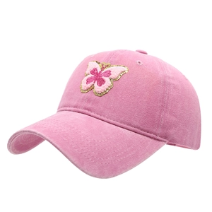 Pink washed cotton baseball cap with 3D butterfly embroidery and curved brim for women