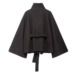 Back view of black wool-blend cape coat featuring loose sleeves and decorative rear belt detail