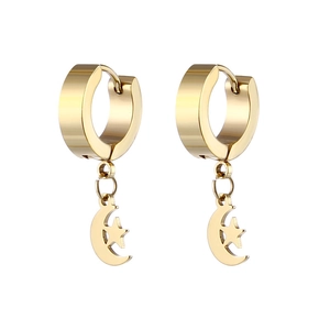 Close-up of golden stainless steel hoop earrings with moon and star shaped pendants