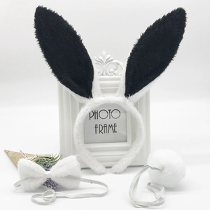 Detailed set of plush bunny ears headband, white bow tie and fluffy tail for party costumes