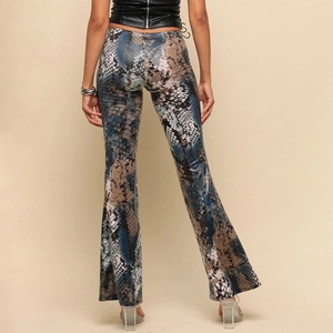 Detail of high-waist flared pants featuring snakeskin print and rear metal zipper closure