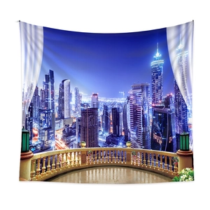 Detail of bohemian wall tapestry featuring city night view with balcony and curtains