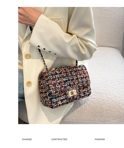 Detail of tweed crossbody bag with gold chain strap and metallic square turn-lock closure