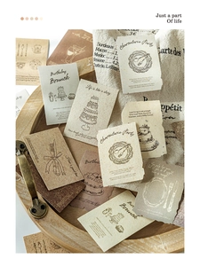 Detail of vintage textured paper stickers with food and drink illustrations for scrapbooking