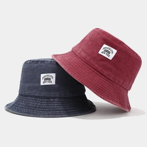 Vintage washed cotton bucket hats in navy and wine red with Brooklyn patch embroidery