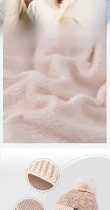 Detail of warm winter set showing plush lining and touchscreen gloves in beige