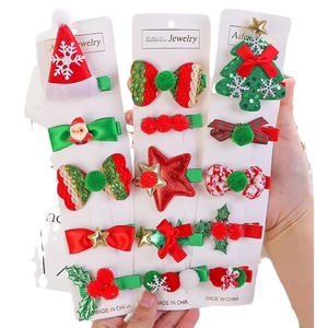 Christmas reindeer and themed hair clip set for girls with festive holiday patterns