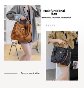 Detail of checkered tote bag with tassel, showing versatile top-handle and shoulder straps