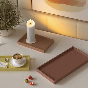 Rectangular resin serving trays in terracotta and mustard yellow for home storage decor
