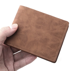 Vintage brown leather wallet for men with textured finish and minimalist bifold design