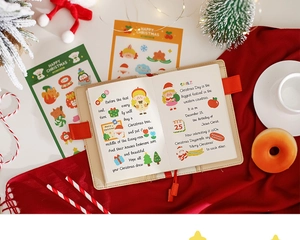 Detailed Christmas journal with beige leather cover and festive stickers on red background