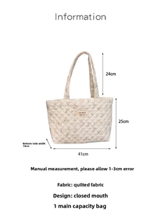 Detailed view of cream quilted tote bag with floral rabbit prints and size measurements