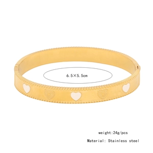 Detailed specs of gold stainless steel heart bangle, 6.5x5.5cm size and 24g weight
