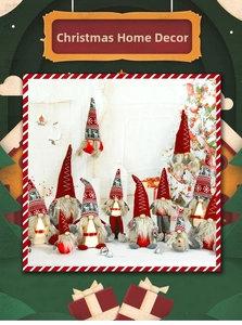 Close-up of glowing LED Christmas gnomes with knit patterns on a festive mantel
