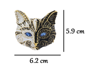 Macro detail of enamel owl brooch with rhinestones and precise size measurements