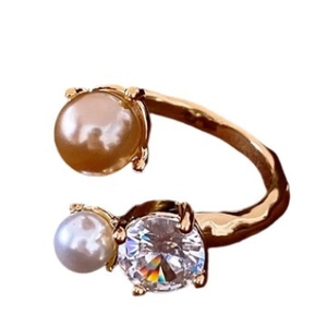 Irregular pearl and zircon open ring with hammered gold texture in vintage style