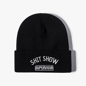 Unisex black knit beanie with white SHIT SHOW SUPERVISOR embroidery for winter wear