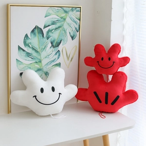 Cartoon plush palm pillows in red and white colors for performance props and home decor