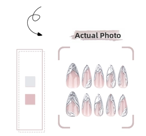 Detailed close-up of 3D silver metallic relief on nude almond press-on nails