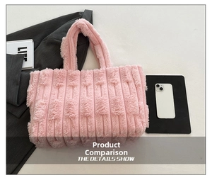 Detailed macro view of the pink faux fur tote bag with vertical textured stripes