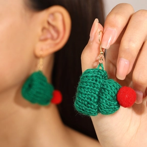 Christmas heart knit earrings with green crochet pattern and red plush pom-pom details