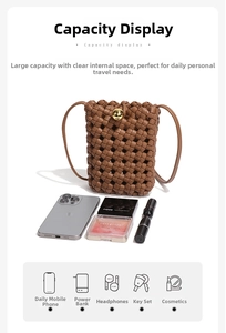 Detail of brown woven phone bag with gold ball clasp showing interior storage capacity