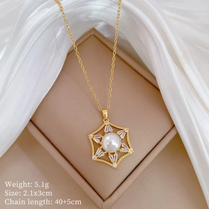 Detail of gold hexagon pearl pendant with sparkling zircon in a jewelry box