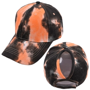 Women's tie-dye ponytail baseball cap with orange and black graffiti pattern