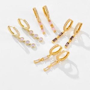 Detail of S925 sterling silver gold earrings featuring colorful gemstone charms