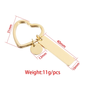 Gold stainless steel keychain with heart ring and metal tags showing dimensions