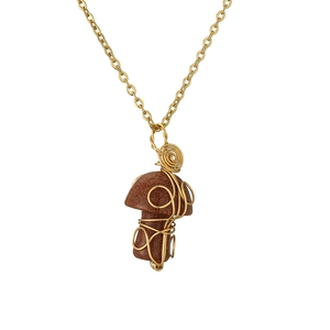 Detailed close-up of brown crystal mushroom pendant with intricate gold wire wrapping