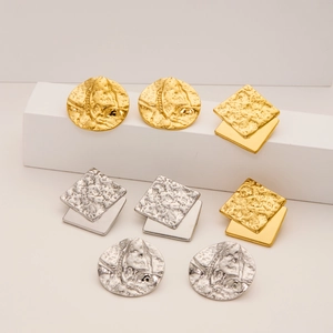 Modern gold and silver chunky geometric stud earrings with hammered texture and 18K plating