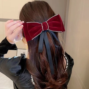 Red velvet bow hair clip with rhinestone trim and long black ribbons for wedding accessories