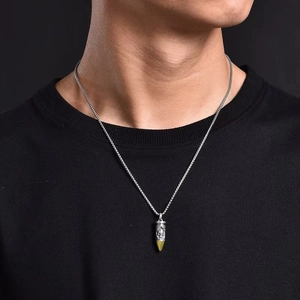 Vintage skull bullet pendant necklace in Thai silver style for men on black shirt
