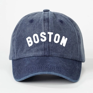 Vintage washed navy blue baseball cap with white arched BOSTON text in a 6-panel style