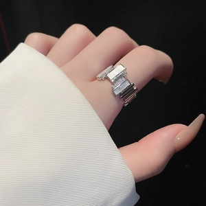 Detail of irregular silver ring with square mother of pearl and pave cubic zirconia