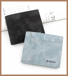 Close-up of matte men's bifold wallets in grey and blue with premium stitching detail