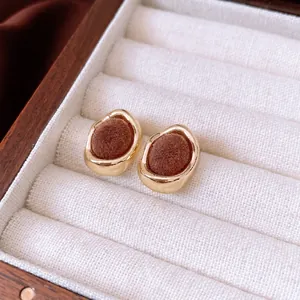 Vintage golden irregular oval stud earrings with brown flocking texture inlay