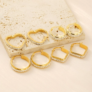 Gold plated titanium steel earrings set with heart and geometric patterns and crystals