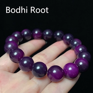Minimalist deep purple Bodhi Root prayer beads bracelet for men and women on black background