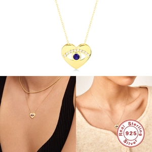 Classic 925 sterling silver evil eye heart necklace in gold with blue stones