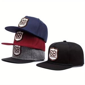 Detail view of four colored snapback hats with athletic 68 shield embroidery on the front
