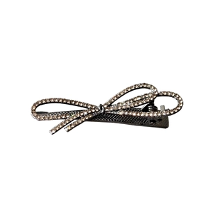 Sparkling rhinestone bow hair clip with dark grey metal base for women's hair styling