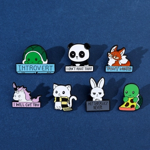 Set of seven colorful cartoon animal enamel pins displayed on a dark blue background