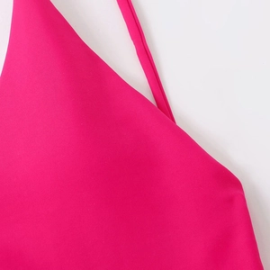 Hot pink backless bikini top with thin straps and elastic seamless texture