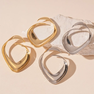 Minimalist irregular geometric metal stud earrings in gold and silver finish for women