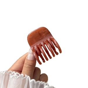 Elegant jelly-colored brown plastic hair claw clip for bun and high ponytail styling