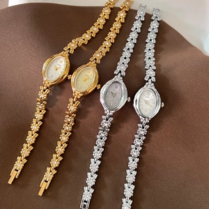 Vintage oval dial watches with rhinestone camellia bracelet in gold and silver