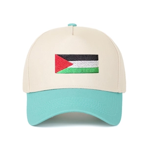Detail view of Palestine flag embroidery on two-tone cotton trucker baseball cap